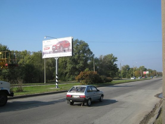 Фото рекламной плоскости по адресу Набережна магістраль – р.Суха Московка , напрямок руху до порту