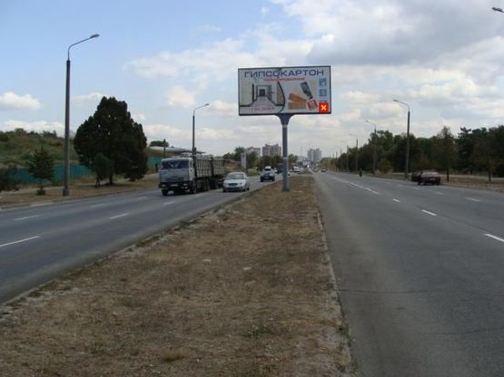 Фото рекламної площини за адресою Набережна магістраль - вул.Бульварна, АЗС, напрямок руху до вокзалу