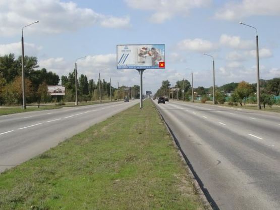 Фото рекламної площини за адресою Набережна магістраль - вул.Бульварна, АЗС, напрямок руху до порту Фото рекламної площини за адресою Набережна магістраль - вул.Бульварна, АЗС, напрямок руху до порту