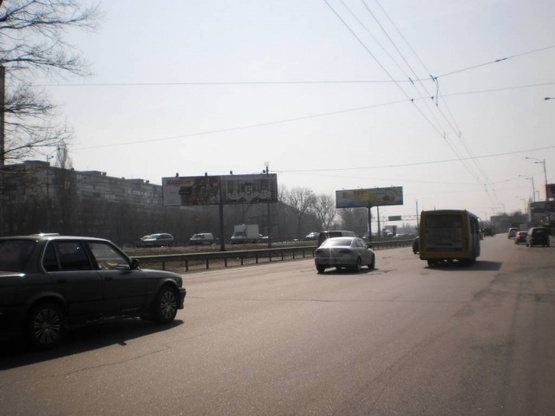 Фото рекламної площини за адресою Окружная дорога, разделитель / напротив пов-та на Жмеринскую ул. по ходу к Жулянскому путепроводу