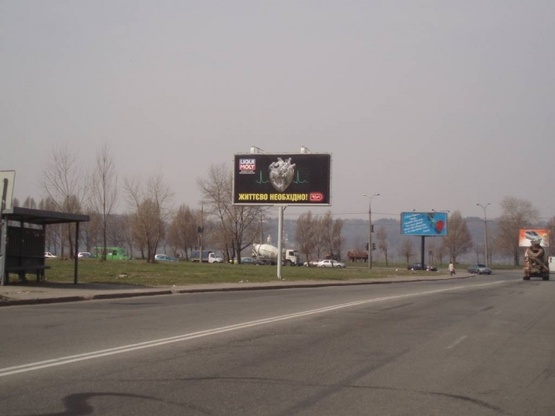 Фото рекламної площини за адресою Березняковская, напр.д.№38 (перед центральным входом в ТЦ"Там-Там")