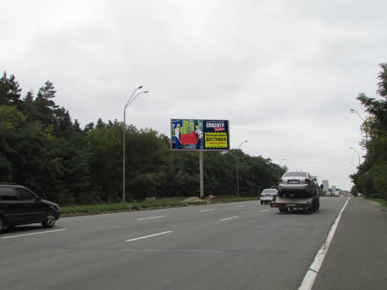 Фото рекламної площини за адресою Броварський проспект (розподілювач), рух в напрямку Броварів, за 200 метрів до АЗС "ОККО"