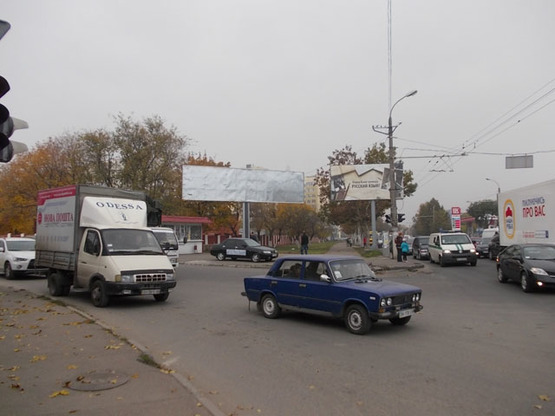 Фото рекламной плоскости по адресу Грушевского Мих. напротив №15а А левая