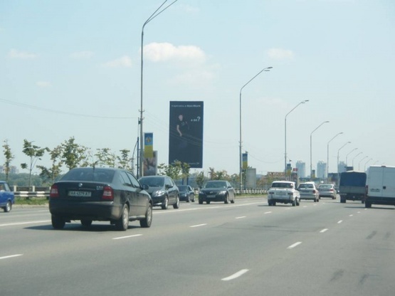 Фото рекламної площини за адресою Набережное шоссе(2)(1200м к Пешеход.мост. )