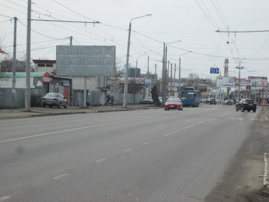 Фото рекламной плоскости по адресу Комарова №31 В Фото рекламной плоскости по адресу Комарова №31 В