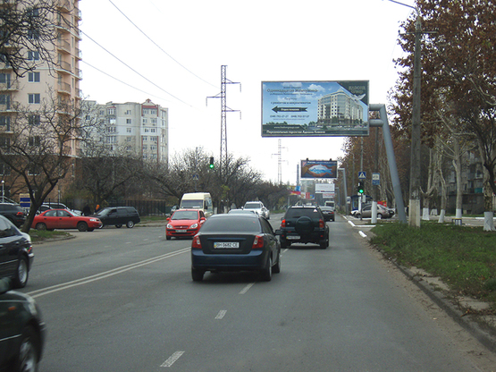 Фото рекламной плоскости по адресу Малиновского -Бизнес центр (ГУСАК)