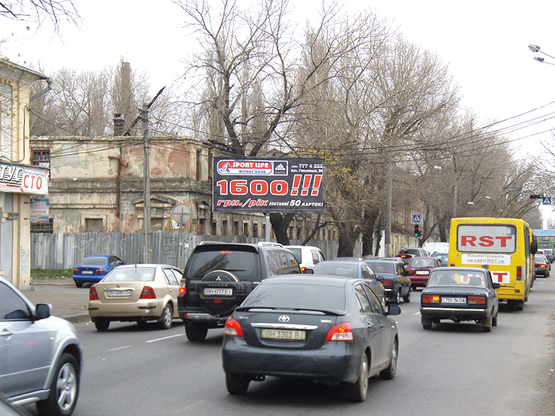 Фото рекламної площини за адресою Ат.Головатого - автосалон "Тотус" ( щит слева) Фото рекламної площини за адресою Ат.Головатого - автосалон "Тотус" ( щит слева)