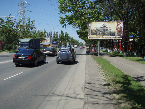 Фото рекламной плоскости по адресу Грушевского - ул.Проценко ( Автосалон РоялМоторс)