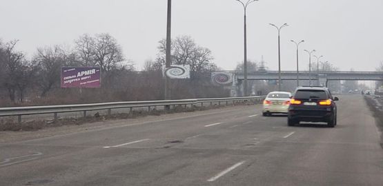 Фото рекламної площини за адресою пр-т Слобожанський - ж/м "Золоті ключі", ТЦ "Метро",  виїзд з міста, в сторону Новомосковська Фото рекламної площини за адресою пр-т Слобожанський - ж/м "Золоті ключі", ТЦ "Метро",  виїзд з міста, в сторону Новомосковська