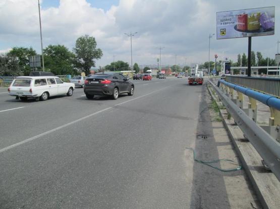 Фото рекламної площини за адресою Б. Окружная, Жулянский мост перед АЗС Сокар в сторону Одесской пл Фото рекламної площини за адресою Б. Окружная, Жулянский мост перед АЗС Сокар в сторону Одесской пл