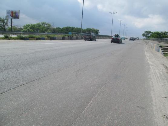 Фото рекламной плоскости по адресу Б. Окружная, Жулянский мост перед АЗС Сокар в пр Победы