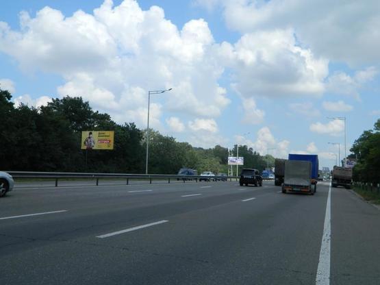 Фото рекламной плоскости по адресу Столичне шосе 320м. до пр. Охотського, праворуч в сторону центра Фото рекламной плоскости по адресу Столичне шосе 320м. до пр. Охотського, праворуч в сторону центра