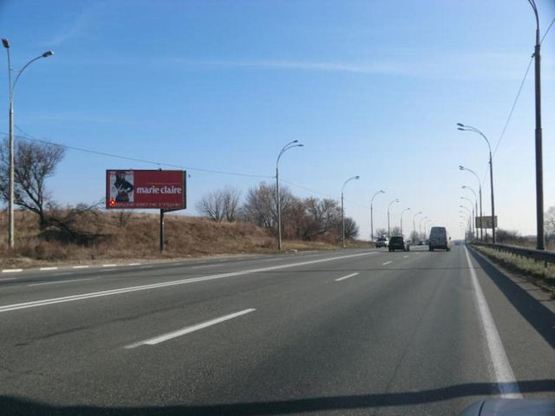 Фото рекламной плоскости по адресу Заболотного ул., 100м до АЗС в напр. от Одесской пл.