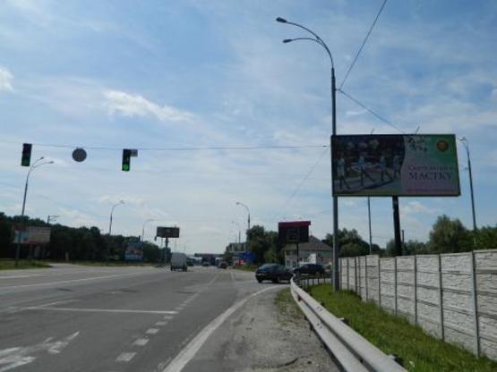 Фото рекламной плоскости по адресу Новообуховская трасса 20+780 справа из Киева