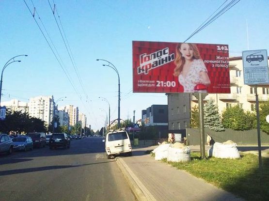 Фото рекламної площини за адресою Вильямса ул., 6а, ("Нова пошта", "Доминос пицца")