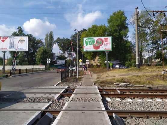 Фото рекламної площини за адресою м. Ірпінь II- вул. Центральна ЖД Переїзд з Ірпіня ліво Фото рекламної площини за адресою м. Ірпінь II- вул. Центральна ЖД Переїзд з Ірпіня ліво