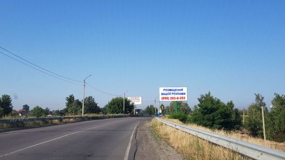 Фото рекламной плоскости по адресу Трасса Р-69, 1750 м. после поворота с ул. Лесная, справа