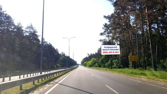 Фото рекламной плоскости по адресу 700 м. после поворота трассы Р-02 на трассу Р-69, в направлении ул. Богатырской, г. Киев, справа