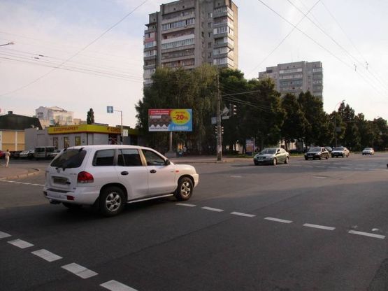 Фото рекламной плоскости по адресу просп. Победы х ул.Комсомольская