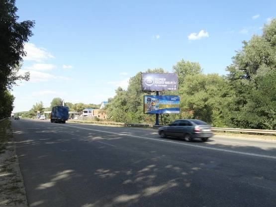 Фото рекламної площини за адресою Киевское шоссе, въезд А верхний Фото рекламної площини за адресою Киевское шоссе, въезд А верхний