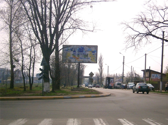 Фото рекламной плоскости по адресу ул. Центральная, возле ж/д переезда