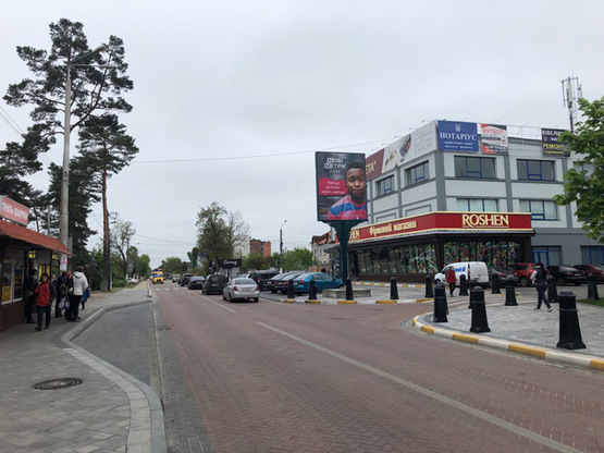 Фото рекламної площини за адресою ул. Соборная, возле магазина «Рошен» (дом 103)