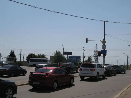 Фото рекламной плоскости по адресу перекрёсток ул.Промышленной, ул.Победы, №02-Б, Перекрёсток, основной въезд в Ильичёвск, дорога из Одессы, с 7-го км., на курорты Грибовка, Санжейка, Каролино Бугаз