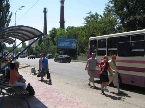 Фото рекламной плоскости по адресу ул.Победы, остановка "рынок Утренний", №24-А, Маршрут всего всего общественного транспорта, район рынка "Утренний".