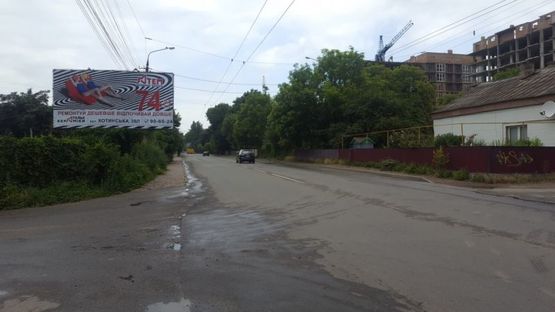 Фото рекламної площини за адресою на розі вулиць Руської та О. Пчілки