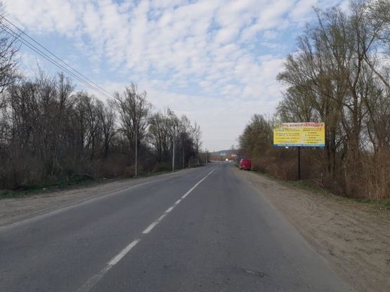 Фото рекламної площини за адресою с. Магала (в сторону ринка Добробут)
