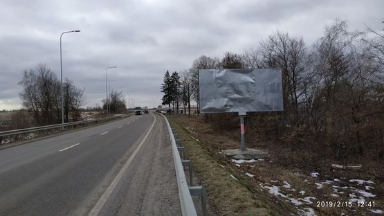 Фото рекламної площини за адресою Автодорога Львов-Пустомиты, въезд в г.Пустомиты, правый
