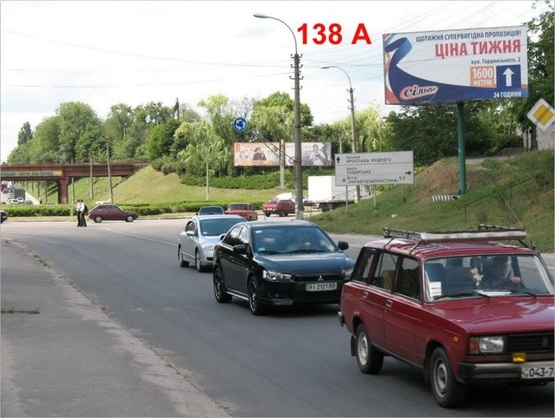 Фото рекламної площини за адресою вул. Київська, на перехресті з Сквирським шосе,  ПОКЛЕЙКА З ВИШКИ