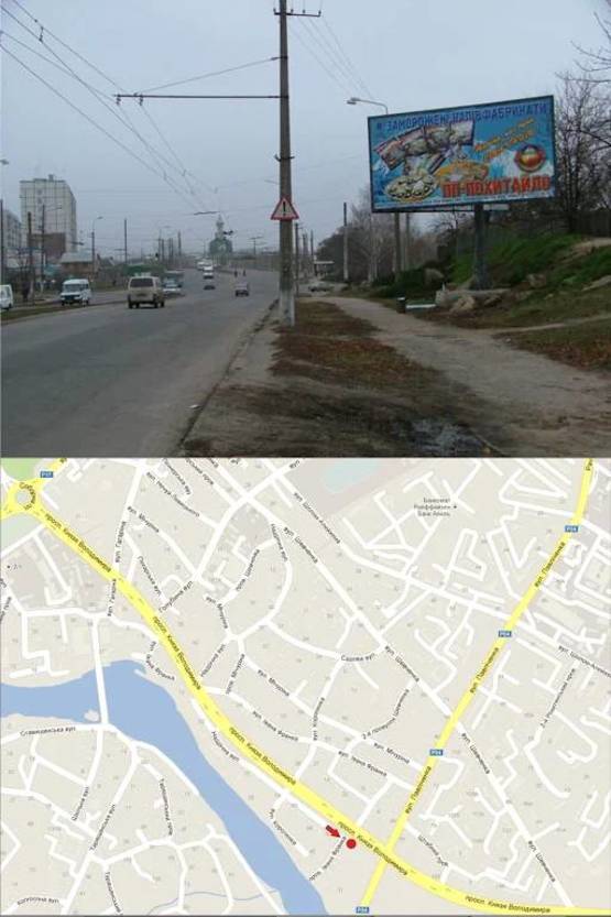 Фото рекламной плоскости по адресу Пер. Князя Володимира та вул. Павлюченко (Ст. А- плоскість, Ст. Б-призматрон). від центра