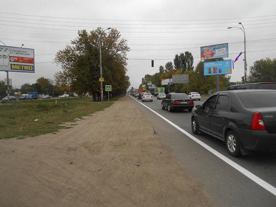 Фото рекламної площини за адресою Кільцева дорога, 300 м до зупинки Ринок "Столичный" (нижня пл.)