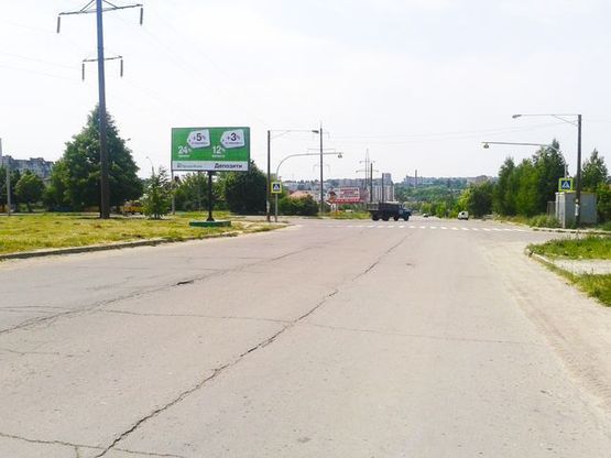 Фото рекламной плоскости по адресу Бандери С.ул. - Мирного П. ул., (напротив Магазин "Еліткераміка",ТЦ "Планета Меблів",продуктовий ринок) Фото рекламной плоскости по адресу Бандери С.ул. - Мирного П. ул., (напротив Магазин "Еліткераміка",ТЦ "Планета Меблів",продуктовий ринок)