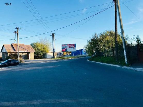 Фото рекламной плоскости по адресу смт.Карнаухівка, вул.Семена Карнауха, в районі буд.№124/76