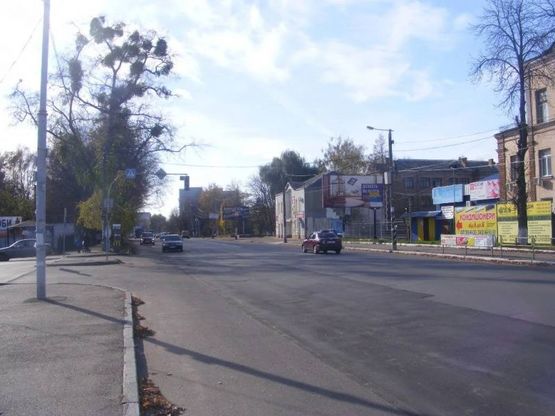 Фото рекламної площини за адресою ул. Грушевского, 91 (въезд на паркинг ТРЦ"Глобал":"Караван", "Фокстрот", "Макдональдс", "Комфи", "Эльдорадо", "Мультиплекс", "MOYO")