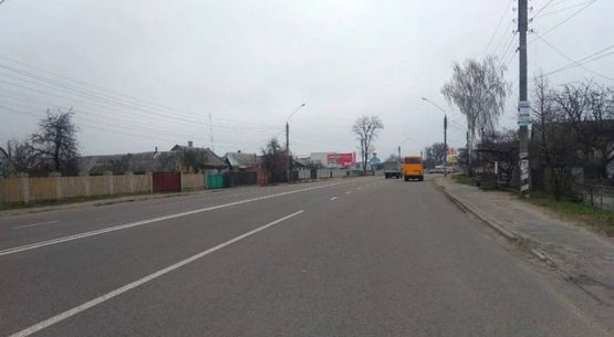 Фото рекламной плоскости по адресу въезд в город со ст.Хмельницкого, Хмельницкое шоссе, с. Тетеревка, большой дачный массив, мебельная фабрика "Интерстиль", в напр. Житомира, 1,7 км до въезда в город