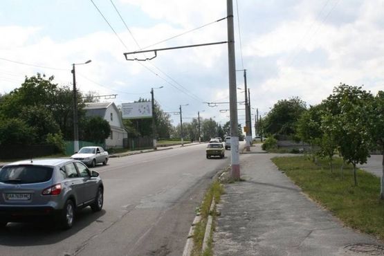 Фото рекламної площини за адресою ул. Чудновская, 56 (из центра, 100м от моста, монумент Славы)