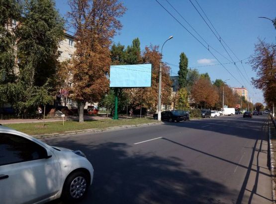 Фото рекламної площини за адресою ул. Троицкая (Красина), 67, район супермаркетов «Брусничка», «Маркетопт», направление из центра Фото рекламної площини за адресою ул. Троицкая (Красина), 67, район супермаркетов «Брусничка», «Маркетопт», направление из центра