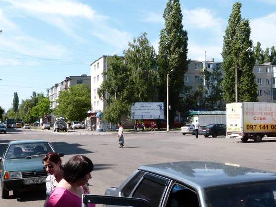 Фото рекламной плоскости по адресу ул. Театральная (ул.Воровского), 35/6, перекр. с ул. Гагарина, напротив автовокзала, направление в центр