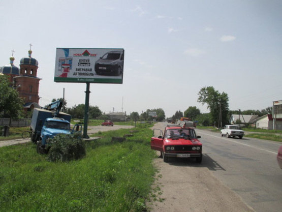 Фото рекламной плоскости по адресу ул. Киевская, возле домовладения № 114, район церкви