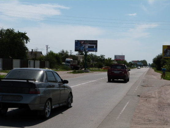 Фото рекламной плоскости по адресу ул. Киевская, 146/2, перекрёсток с ул. Комарова, остановка «Весёлая»