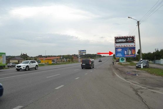 Фото рекламной плоскости по адресу Полтавский шлях-пос.Песочин-ул. Автомобильная напротив двух АЗС (выезд из города)