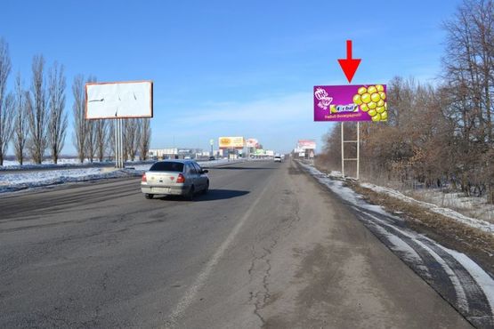 Фото рекламной плоскости по адресу Московский пр-т - Ростовская трасса возле АЗС ОККО 7(въезд в город)