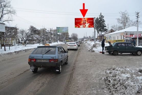 Фото рекламной плоскости по адресу Мерефа-ул. Днепровская-ул. Кобзаря-флажок№2-в центр