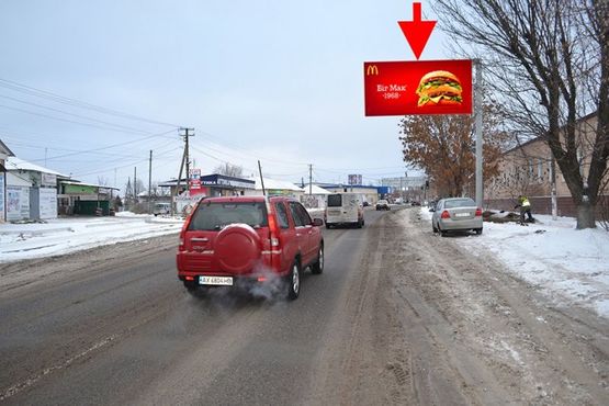 Фото рекламной плоскости по адресу Мерефа-ул. Днепровская-возле маркета АТБ- флажок№2- в ст Харькова