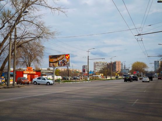Фото рекламной плоскости по адресу Запорізьке шосе, розвилка, автостоянка/Запорожское шоссе, развилка, автостоянка, перед ТЦ Дафи, рядом МакДональдс, Мультиплекс