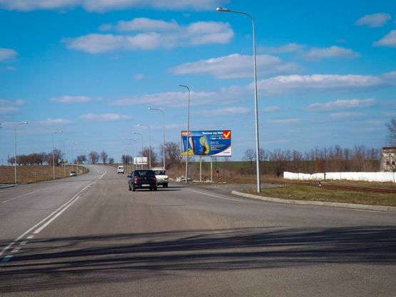 Фото рекламної площини за адресою вул. Яснополянська - траса на Аеропорт/ул. Яснополянская - трасса на Аэропорт Фото рекламної площини за адресою вул. Яснополянська - траса на Аеропорт/ул. Яснополянская - трасса на Аэропорт