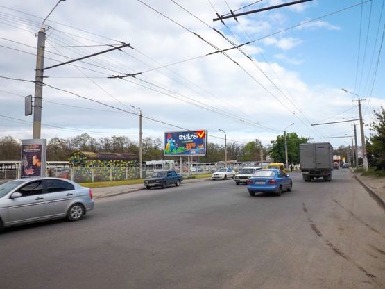 Фото рекламної площини за адресою вул. Марії Лисиченко, автостоянка/ул. Героев Гражданской войны, автостоянка